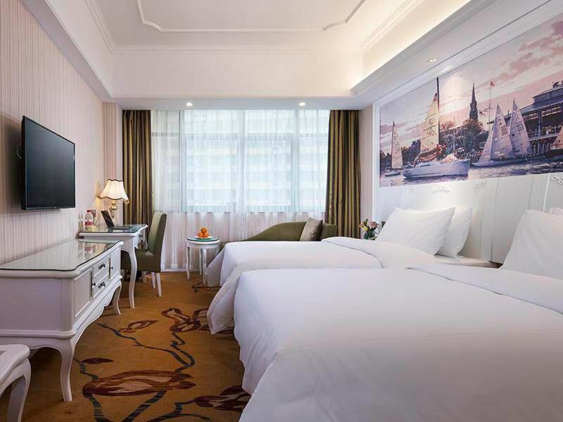 Vienna International Hotel Fenghua Zhongshan Road Extérieur photo