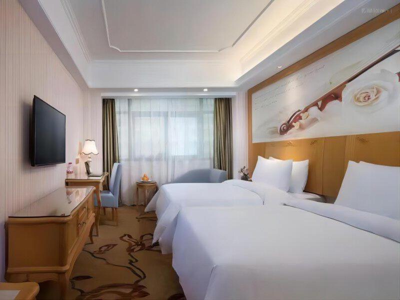 Vienna International Hotel Fenghua Zhongshan Road Extérieur photo